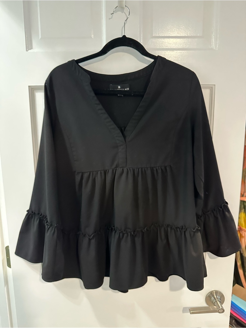 Pomander Place Black V-Neck Ruffle Tiered Blouse